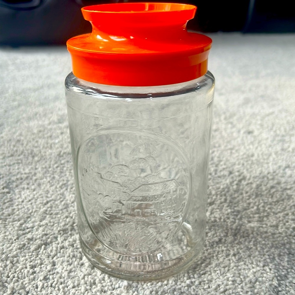 Vintage Anchor Hocking jar with orange lid